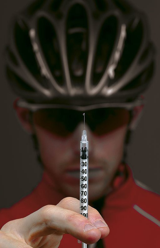 cyclist holding injection with EPO
